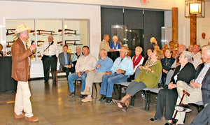 Collection stories intrigue crowd at exhibit opening