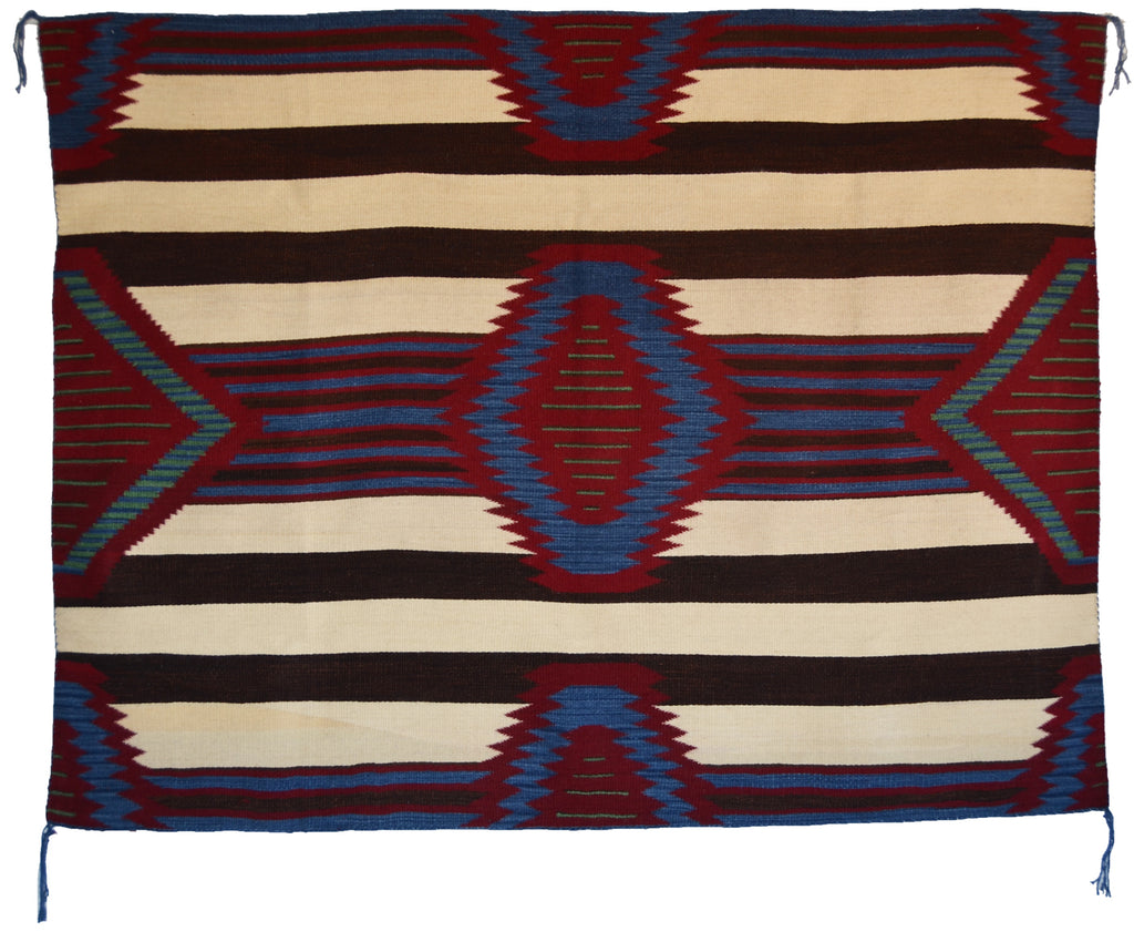 Woven textile with geometric pattern featuring red, blue, and brown colors on a white background
