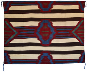 Woven textile with geometric pattern featuring red, blue, and brown colors on a white background