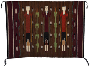 Woven textile with a pattern of Yei with Tree of Life on a brown background